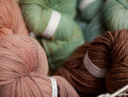 Old Bus Depot Markets Theme Event A Celebration of Wool. Green and brown skeins of wool.