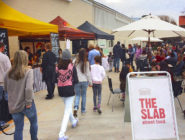 Visitors enjoying The Slab at the Old Bus Depot Markets