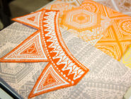 Yellow; orange and grey printed linen at the Old Bus Depot Markets theme event, Creative Fibre