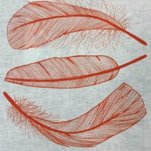 Orange feather print on fabric by Creative Fibre Stallholder at the Old Bus Depot Markets, Blue Radish