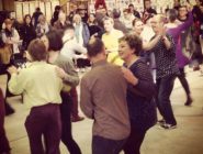 Jumptown Swing performing at the Old Bus Depot Markets eith a crowd watching