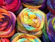 Skiens of rainbow wool at the Old Bus Depot Markets theme event - A Celebration of Wool