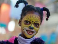 Young girl with her face painted at the Old Bus Depot markets theme event Kids in the Shed
